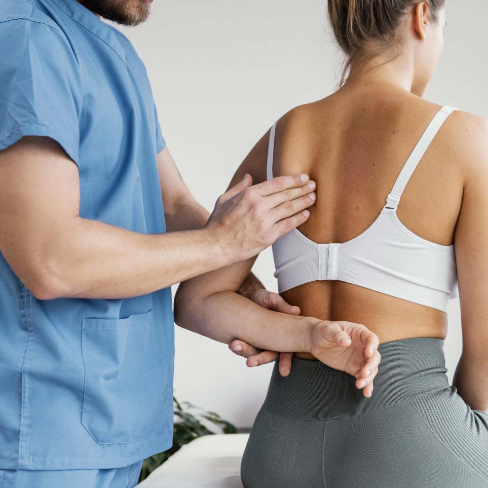 Claire, registered osteopath, treating a patient